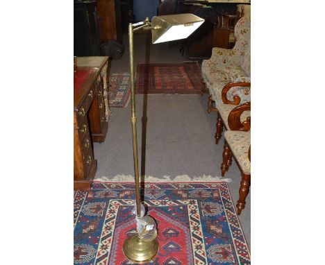 A 20th Century brass floor standing bankers style lamp, 136cm high
