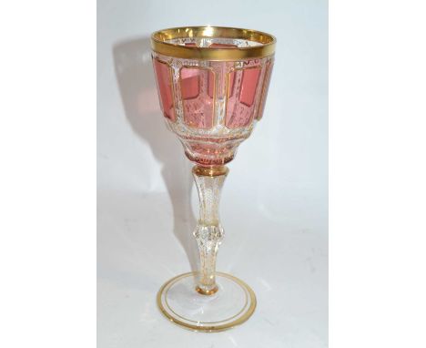 A continental glass chalis type vase with a gilt scroll design and ruby coloured glass panels, 20cm high