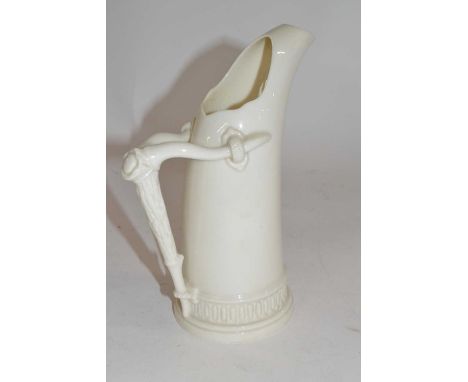 An early 20th Century Worcester jug of tusk form with branch handle, 17cm high