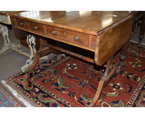 19th century mahogany drop leaf sofa table with two frieze drawers raised on end supports with outswept legs, brass end caps 