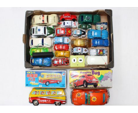 Tinplate: A collection of assorted clockwork and battery operated Volkswagen and other vehicles, tinplate and plastic example