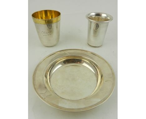 A German Sterling silver and silver gilt christening cup, inscribed 'Oliver, 27.8.1972', together with a French silver beaker
