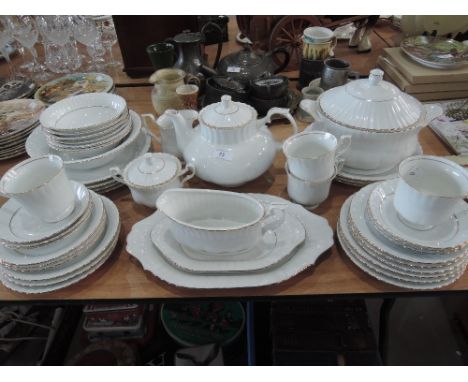 A Chodziez part dinner and tea service in white and gilt (44 pieces approx)