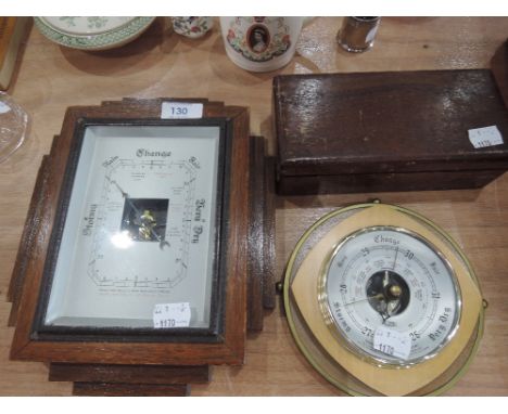 A mid 20th century square framed barometer , a Metamec barometer and a treen box