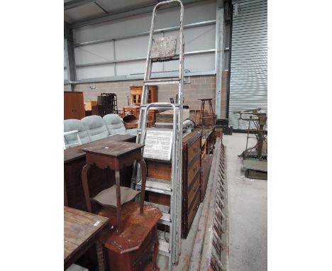 Two sets of aluminium step ladders