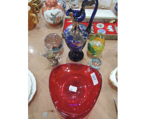 A selection of art glass including Mdina paper weight, millifiori paperweight and ruby glass bowl etc