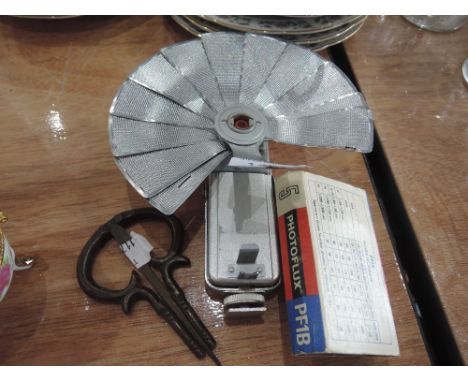A camera flash gun and Jews harp etc