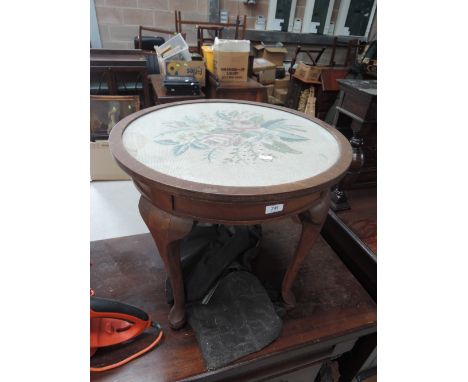 A mid 20th Century occasional table having tapestry top