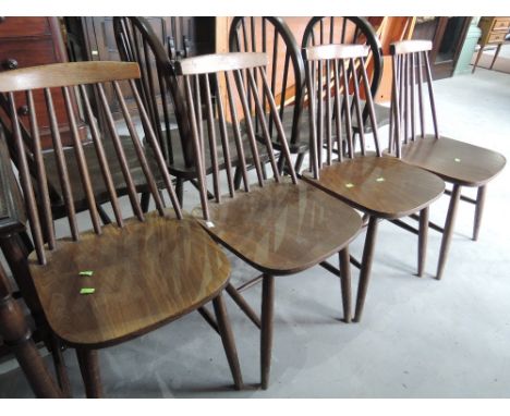 A set of 4 Ercol style stick back dining chairs (mid stain)