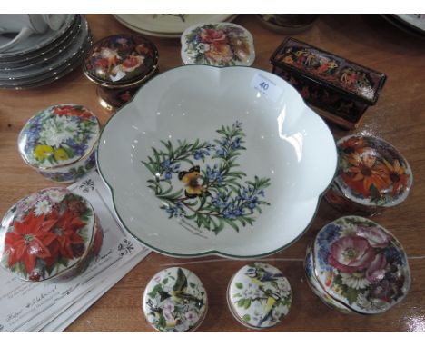 A selection of seven Ardleigh Elliot ceramic musical trinket boxes, a Royal Worcester 'Herbs' bowl and two Falcon ware trinke