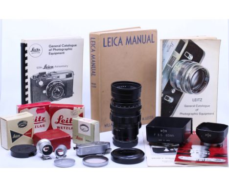 Leica: A Leitz Canada Summicron 1:2/90mm lens, Reference No. 2500191. Slight dusting to lens. Together with a Leica-Meter MR 