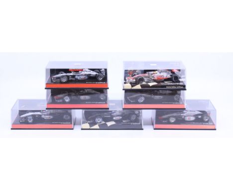 Minichamps: A collection of seven boxed Paul's Model Art Minichamps 1/43 Scale, McLaren Formula 1 diecast vehicles. David Cou