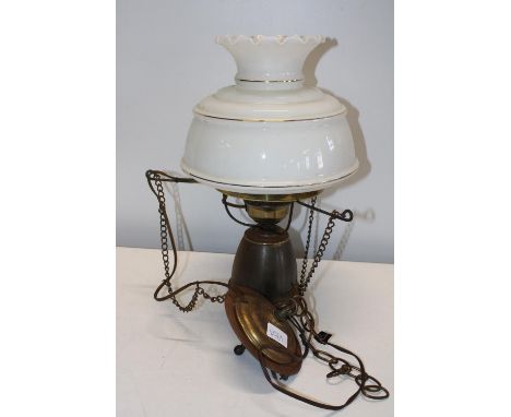 A vintage brass and glass hanging lamp 
