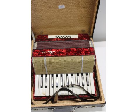 A vintage cased Lyca German piano accordion 