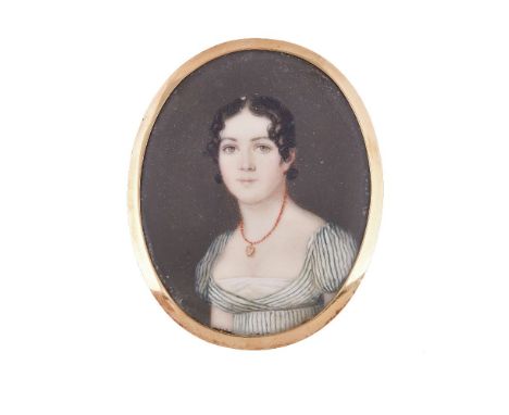 ϒItalian School (circa 1810) Portrait of a young lady Watercolour on ivory 5.3cm x 4.2cm, oval In a gilt metal fillet, no fra