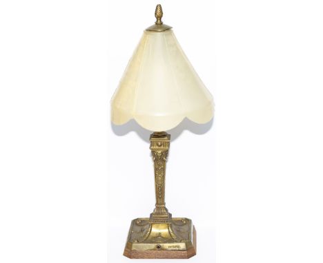 Pullman Type C brass table lamp decorated with Ram's Heads and Greek Urns and stamped on the side of the base NEPTUNE. From a