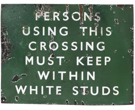 BR(S) enamel railway station sign PERSONS USING THIS CROSSING MUST KEEP WITHIN THE WHITE STUDS. In fair condition with some c