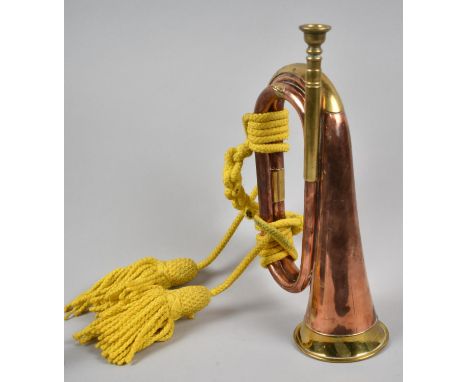 A Military Copper and Brass Bugle by L P Potters of Aldershot, 30cm high 