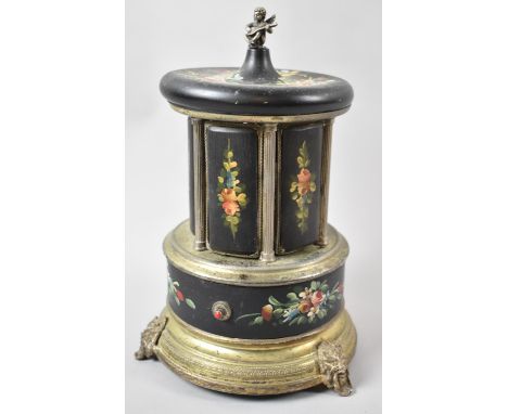 A Mid 20th Century Circular Musical Cigarette Dispenser with Cherub Finial and Floral Decoration, Three Scrolled Feet, Playin