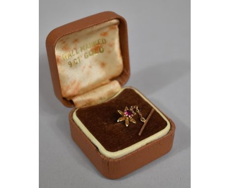 A 9ct Gold and Ruby Floral Tie Pin, 1.6g 