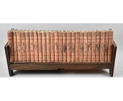 An Edwardian Wooden Book Trough Containing 25 Volumes Punch Library of Humour Published by The Educational Book Company Ltd 
