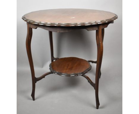 An Edwardian Circular Occasional Table with Stretcher Shelf and Extended Cabriole Supports 