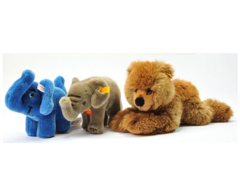 Steiff plush trio including: (1) Elefant, white tag 995781, LE 1500, blue plush, swing label, 8"/20cm; (2) Baby Elefant, yell