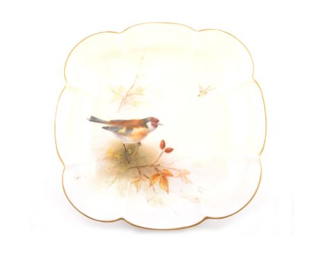 A Royal Worcester shallow dish, date mark for 1921, painted with a Goldfinch, signed E. Barker, width 23cm.