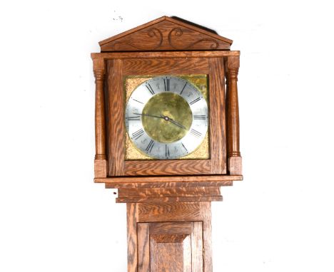 Contemporary oak longcase clock, square brass dial with silvered chapter ring, case with fielded panels, height 218cm.