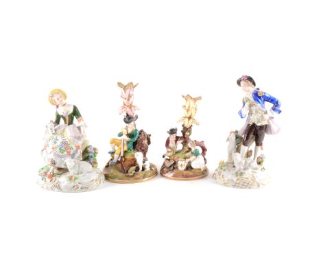 Two English porcelain chambersticks, one modelled with a seated sportsman, the other with a couple by a stream, both restored