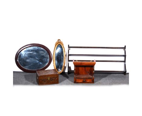 A Far East carved and camphor wood box, width 31cm; a stained pine spice rack; Ercol plate rack; and two mirrors. (5)
