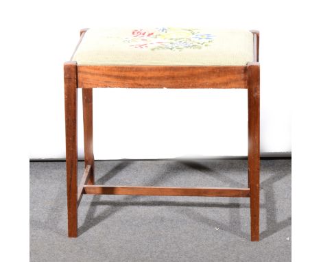 A mahogany dressing table stool, gros point needlework upholstery, square tapering legs, 51cm x 40cm.