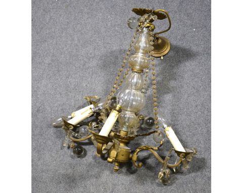 A gilt metal four-light chandelier with prismatic drops and sphere pendants, 60cm drop.Footnote: Sold on behalf of LOROS - Th