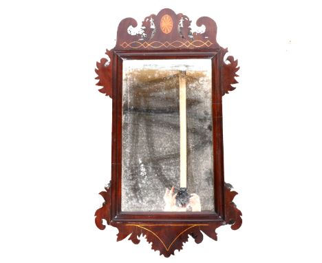 A Chippendale style inlaid mahogany pier glass, rectangular plate, fretted outlines, 80cm x 48cm.