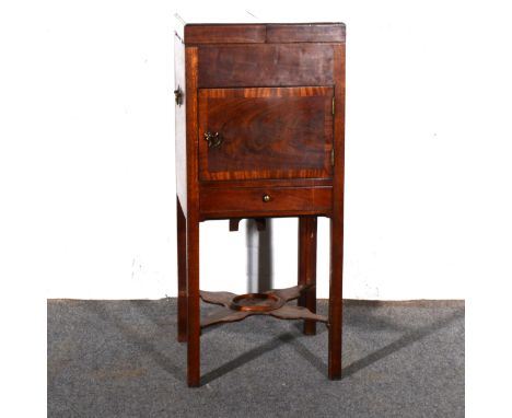 A George III mahogany washstand, rectangular hinged lid, above a pot cupboard and a drawers, legs joined by a shelf, width 37