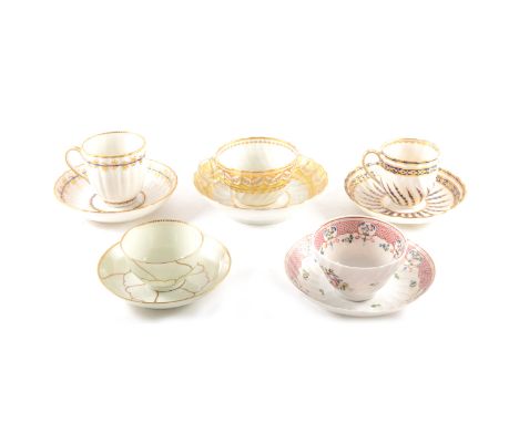 A Derby coffee cup and saucer, wrythen moulded, puce mark; another puce marked Derby cup and saucer, Barr, Flight &amp; Barr,