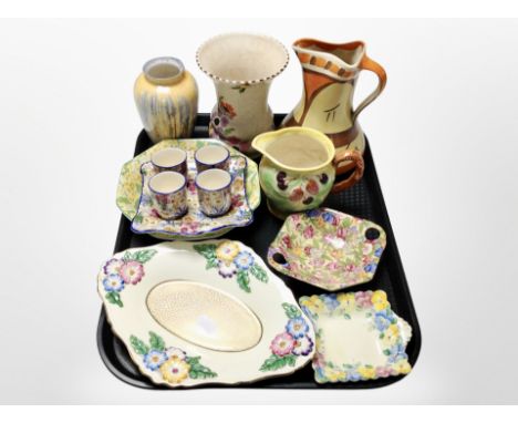 A group of ceramics including set of four Royal Winton ivory egg cups on matching stand, Crown Staffordshire dishes, Myott an