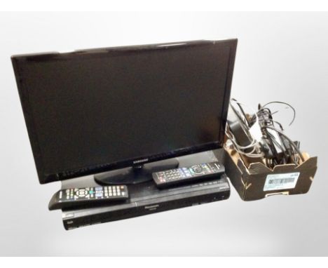 A Samsung 22" LCD TV, a Panasonic DVD Recorder, remotes, leads, etc.