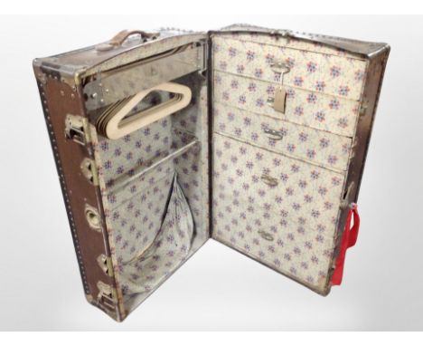 A Watajoy travelling wardrobe trunk with fitted interior, length 93cm.