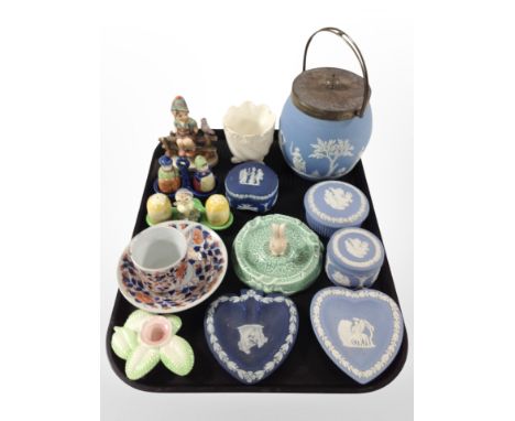 A group of ceramics including several Wedgwood Jasperware trinket boxes, biscuit jar, a Goebel figure of a boy, Carlton Ware 