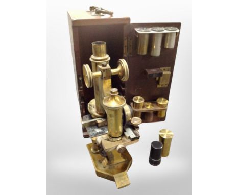 A lacquered brass microscope by R and J Beck Ltd of London, No. 24596, in mahogany box.