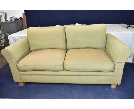 A contemporary two seater sofa. H.95 W.191 D.93cm