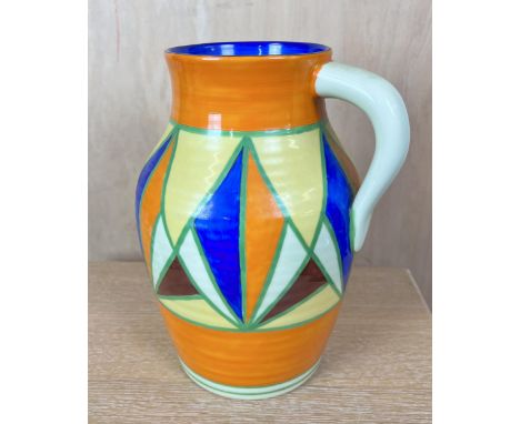 A Clarice Cliff style Lotus jug, hand painted. H.30cm