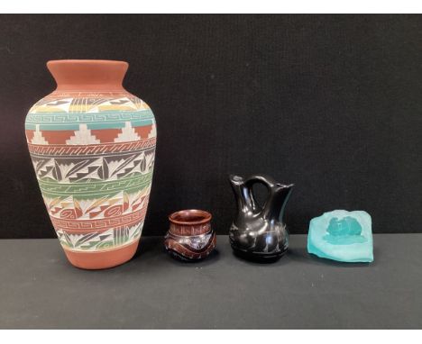 Tribal art - a Navajo terracotta vase, incised with geometric band motifs, marked Tee Dine (The People), 31cm high;  Black we