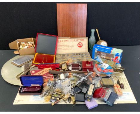 A collection of Ronson and other pocket lighters, cufflinks, and dress jewellery, British and international coins, cymbals, t