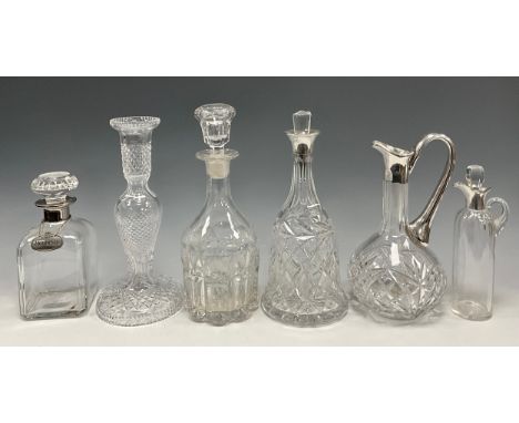 An Edwardian silver mounted glass oil jug, moulded body, shallow silver spout, 21cm high, Hukin &amp; Heath, Birmingham 1905;