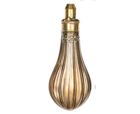 A copper powder flask “Fluted”  (Riling 289), sprung brass charger with graduated nozzle 3-4 drams, 8” overall. GC Plate 16  