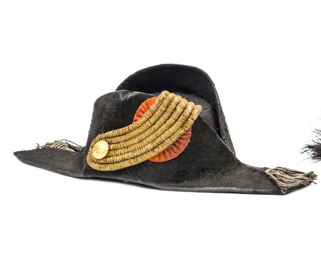 A late 19th century Dutch naval officer’s cocked hat, black beaver body, silver bullion tassels, on scarlet, fore and aft, tr