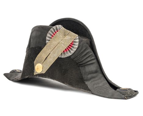 A 19th cent Bavarian officer’s cocked hat, gilt lace loop on gilt/red rosette, button bearing crowned/L, bullion rosettes for