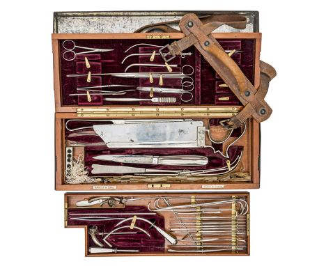 A very good WWI army surgeon’s field service case of instruments, the crimson velvet lined case with lift out tray, containin
